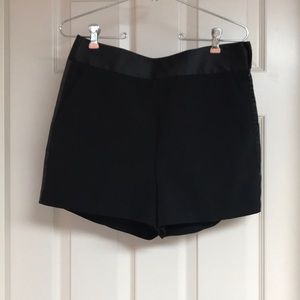 Black silk lined mid-rise shorts